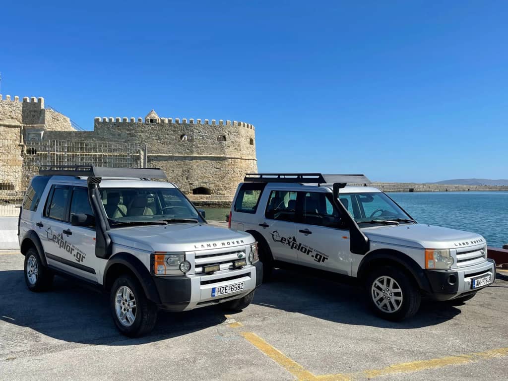 V.I.P. Safari tour jeeps of EXPLOR.GR parked in front of the Koules fortress in Heraklion